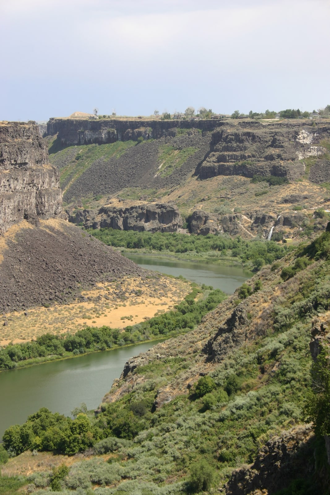 Snake River Canyon in Twin Falls, Idaho. You can see a waterfall in the distance on the right.